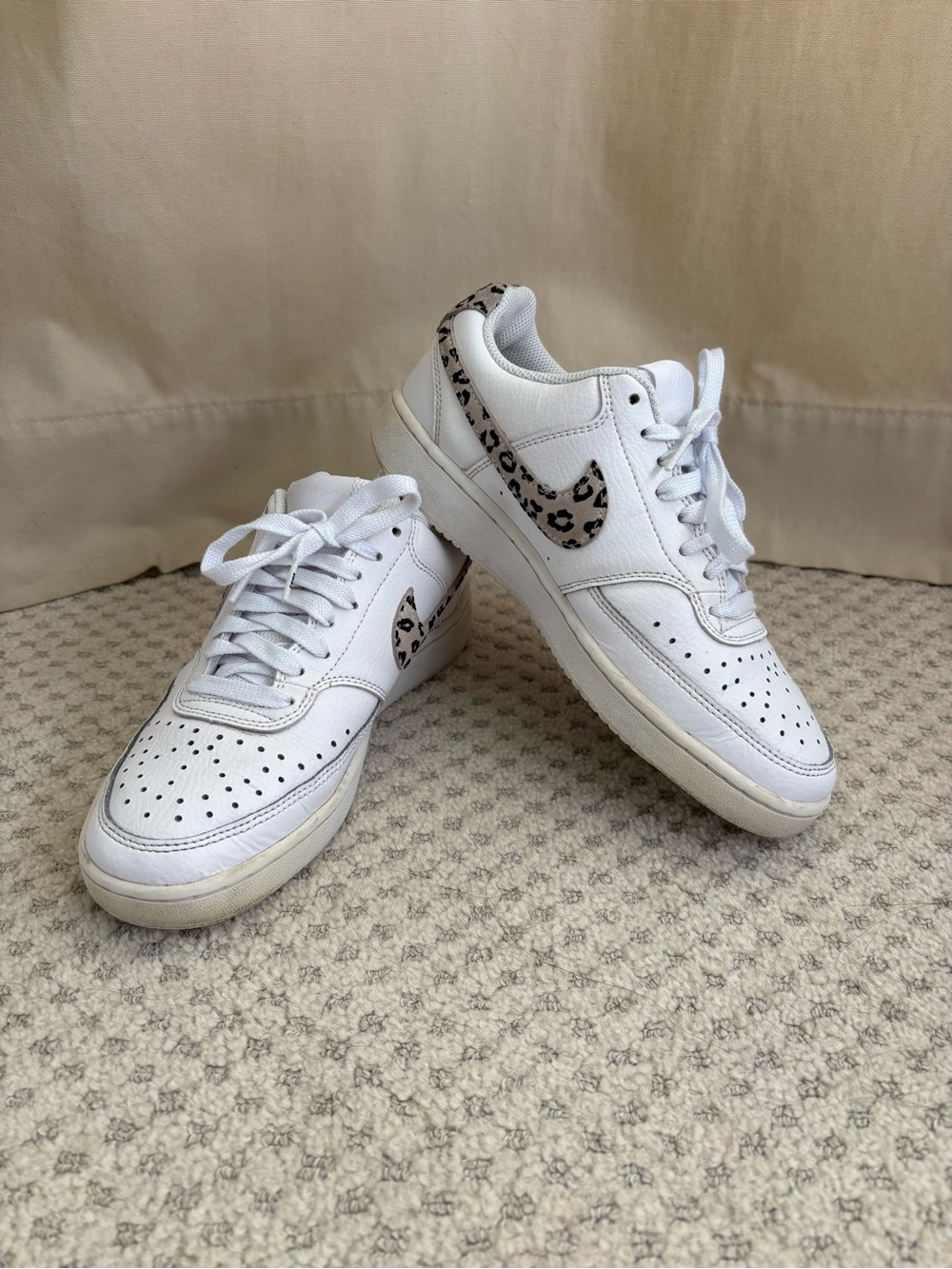 Nike Women's White Low-Top Sneakers with Leopard Swoosh Accent